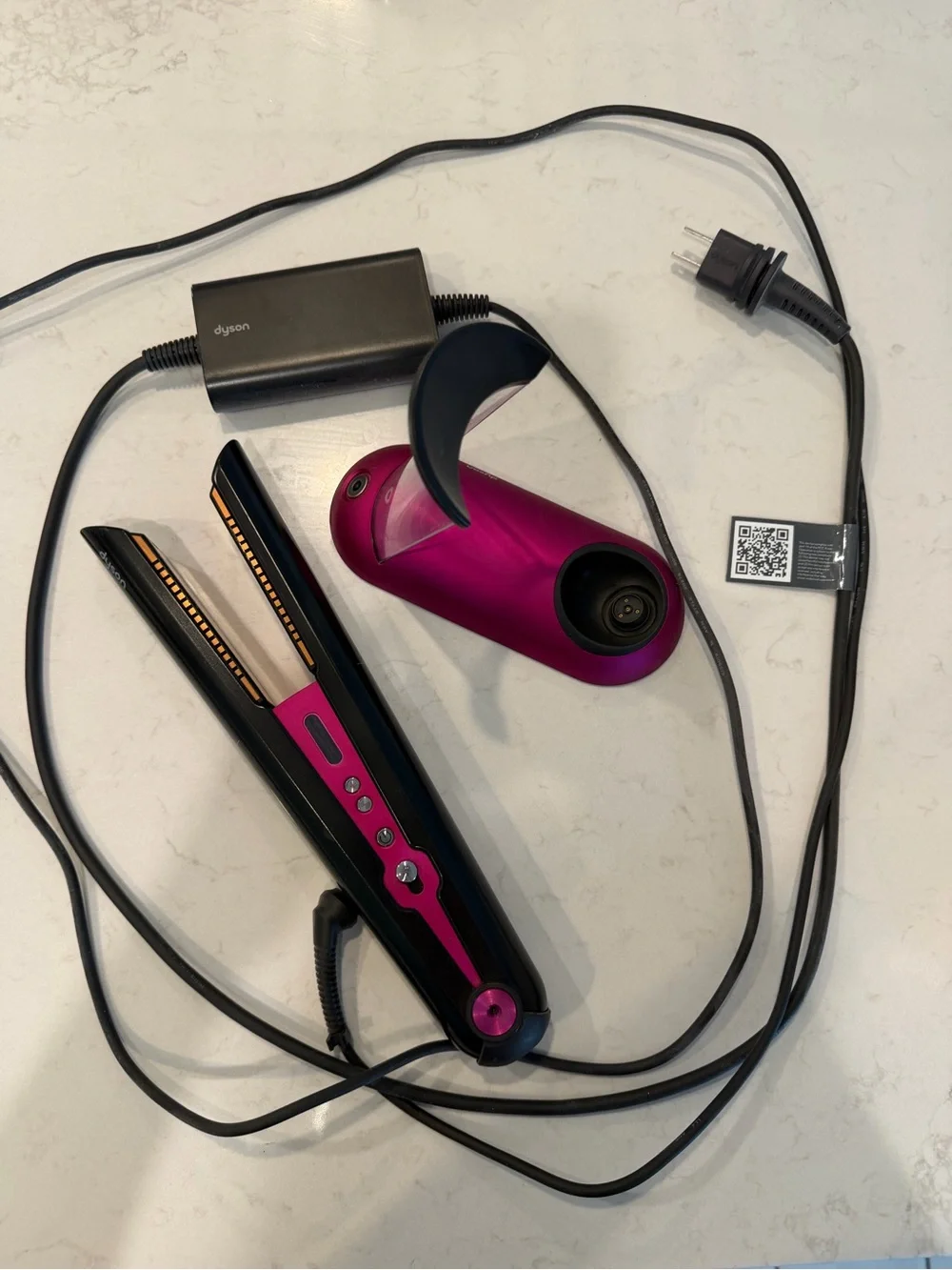 Dyson hair straightener in black and pink
